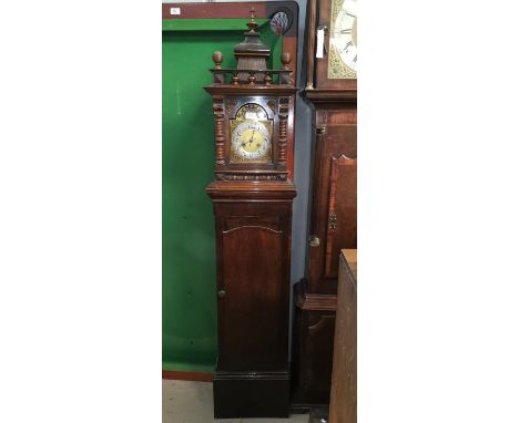 A 19th century bracket clock in carved walnut architectural case, spindle turned decoration, brass dial and striking movement