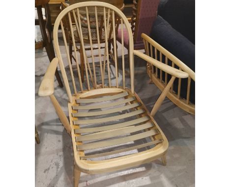 An Ercol lightwood low seat armchair - frame only 