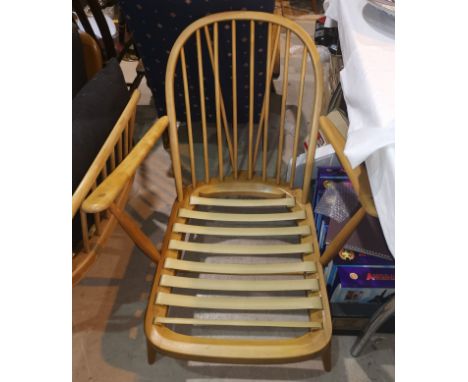 An ercol lightwood low seat armchair - frame only 