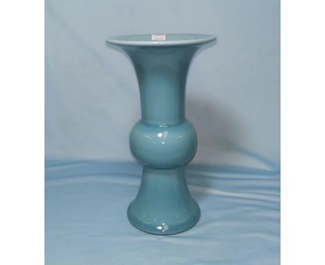 A Chinese porcelain gu vase with blue glaze, square seal mark to base, 26 cm 