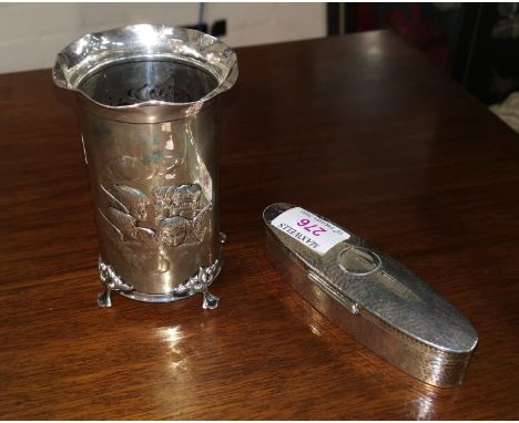 A silver cylindrical vase stand with embossed cherub decoration, Birmingham 1903; a silver oval planished trinket box, London