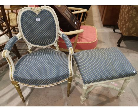 An early/mid 20th century French armchair and stool with cream and gilt frame, reupholstered in turquoise and gilt fabric 