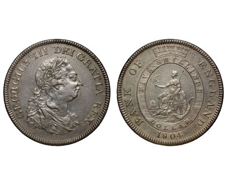 George III (1760-1820), silver Bank of England Dollar, 1804, Soho Mint struck over a Spanish Eight Reales, engraved by Kuchle