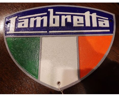 Cast iron Lambretta plaque, W: 35 cm. P&amp;P Group 1 (£14+VAT for the first lot and £1+VAT for subsequent lots) 