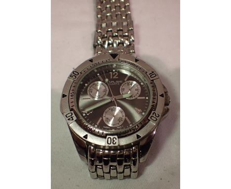 Pulse quartz wristwatch on stainless steel bracelet, working at lotting. P&amp;P Group 1 (£14+VAT for the first lot and £1+VA