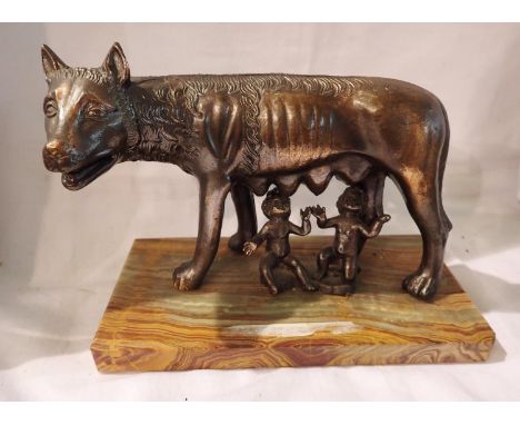 Bronzed cast metal figurine of Romulus and Remus feeding from Lupa on marble base, H: 12 cm. P&amp;P Group 1 (£14+VAT for the