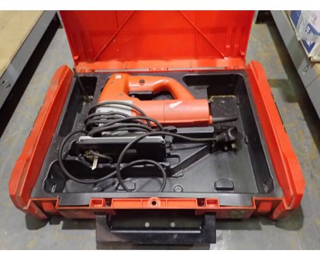 Cased Milwaukee corded jigsaw. Not available for in-house P&PAll electrical items in this lot have been PAT tested for safety