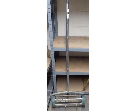 Draper manual lawn aerator. Not available for in-house P&amp;P 