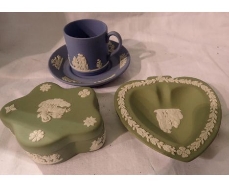 Four pieces of Wedgwood Jasperware including a cup and saucer. P&amp;P Group 2 (£18+VAT for the first lot and £3+VAT for subs