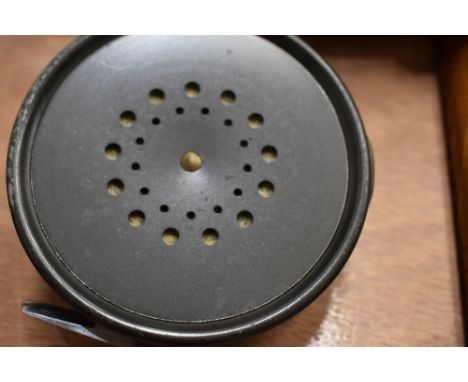 A Hardy Brothers fly reel marked The Perfect  3  7/8  with a grey agate line ring