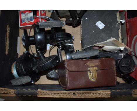 6 vintage fishing reels including Ambassadeur Mitchell and K P Morritts, 2 gunslips and a pack of cardboard targets
model num