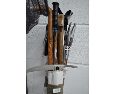 Three shooting sticks three walking sticks and an ice axe