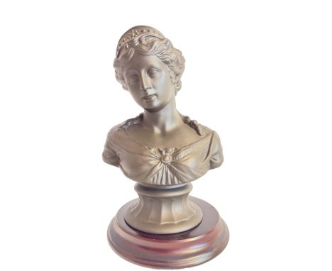 Wedgwood ceramic bust depicts a classical female figure, mounted on a wooden base.