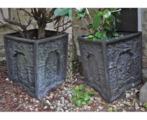 A pair of composite square section garden urns decorated in relief with George &amp; the Dragon, 35cm square, 42cm high (2)We