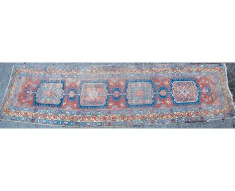 An Eastern red ground runner, 85cm x 330cm together with a brown ground rug, 106cm x 172cm (2)Runner in very worn condition w