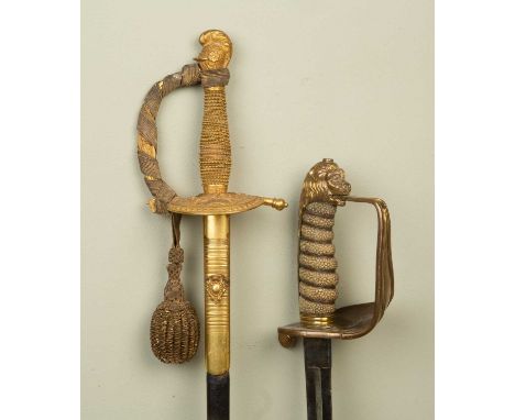 Two swords; one presentation sword, stamped 'CSSA, Bedford, S1, Covent Garden, WC', with leather and brass scabbard, the blad