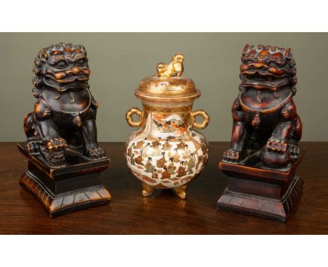 A small Satsuma Koro decorated with village scenes and dog finial to the lid, 16cm high; together with a pair of hardwood car
