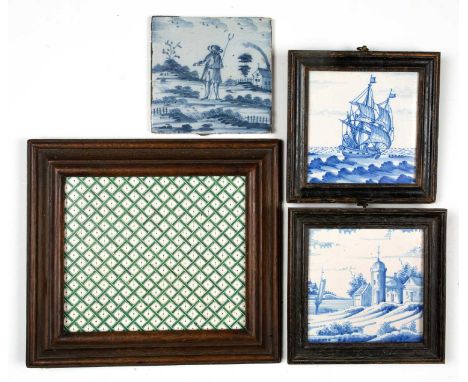 A mixed group of various antique and modern tiles to include three blue and white Dutch Delftware tiles, two framed; a large 
