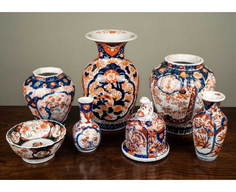 A group of Imari porcelain comprising; five various sized vases, the largest 31cm high; a ceramic bowl, 16cm diameter; and a 