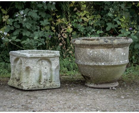 A circular cast reconstituted stone garden planter with banded ornament, 53cm diameter x 43cm high, together with a hexagonal