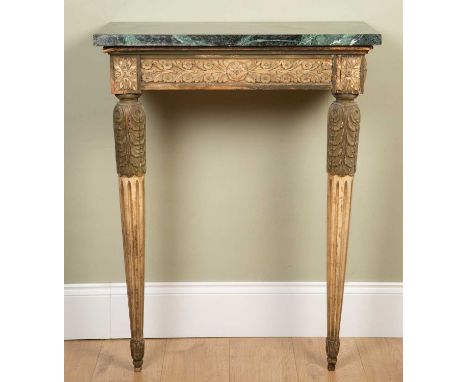 An antique marble top console table, with carved frieze and carved tapering legs, 75cm wide, 39cm deep, 97cm high The marble 