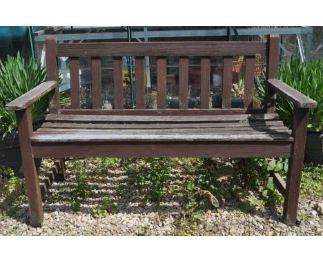 A teak garden bench with slatted back and seat, 122cm widthWeathered, structurally sound.