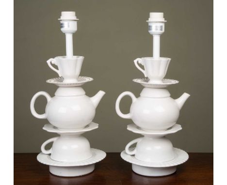 A pair of novelty white glazed ceramic table lamps constructed from cups, saucers and teapots, approximately 19cm diameter x 