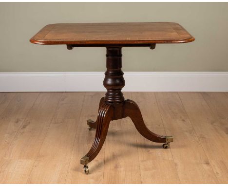 A Georgian mahogany and inlaid tilt top table on tripod base, 65.5cm wide x 82cm long x 71cm highTable top with ring marks an