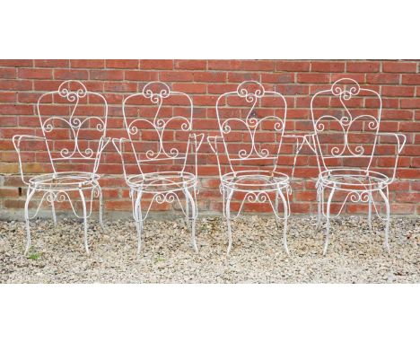 A set of four white painted wirework garden armchairs, 46cm wide, 97cm highIn need of replacement seats; wear to the paintwor