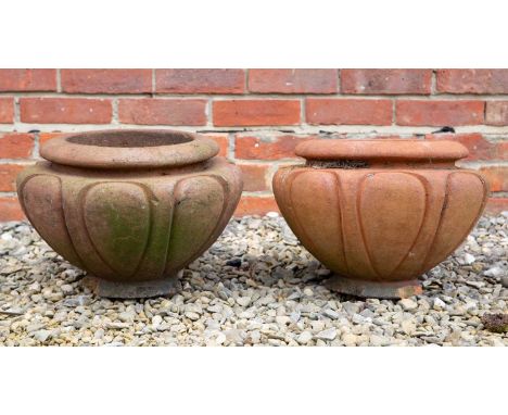 A pair of Compton pottery 'Leix' terracotta pots, each of typical form with lobed bodies, early 20th century, 33cm diameter x