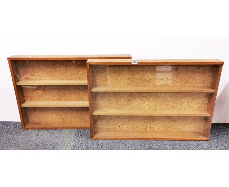 A pair of wall mounted light oak collectors display cabinets, 91cm x 61cm x 10cm.