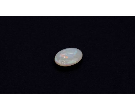 An unmounted cabochon cut opal, approx. 5.18ct.