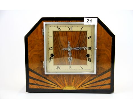 An Art Deco inlaid walnut veneered chiming mantel clock H. 22cm.