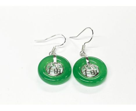 A pair of rhodium plated silver and jade drop earrings, jade dia. 18mm.