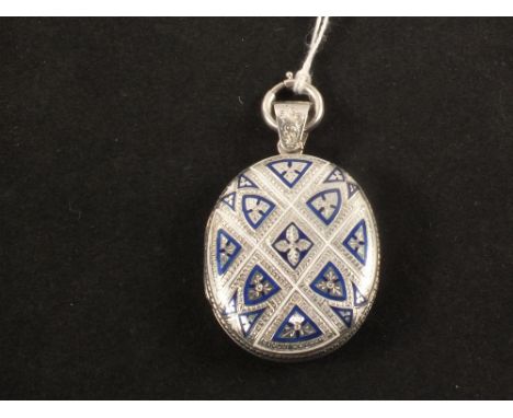 A white metal locket with chased and blue and white enamel decoration