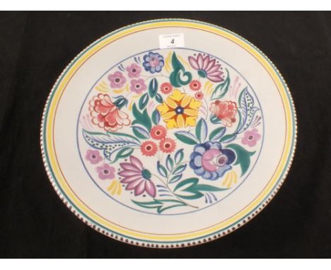 A Poole floral charger, marked X/CS, dia 13"