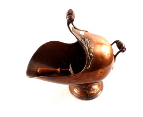 A 19th Century copper coal helmet and scoop