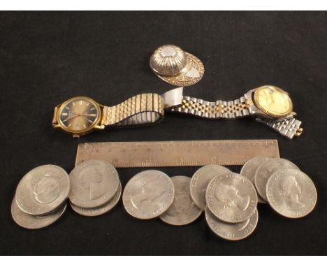 A silver jockeys cap caddy spoon, various crowns, two watches plus a ruler