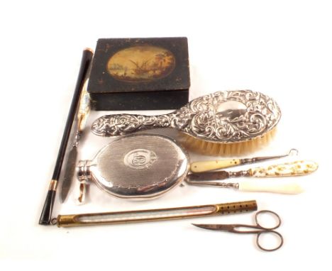 A gold mounted cigarette holder, green house thermometer, hip flask, silver brush plus other items