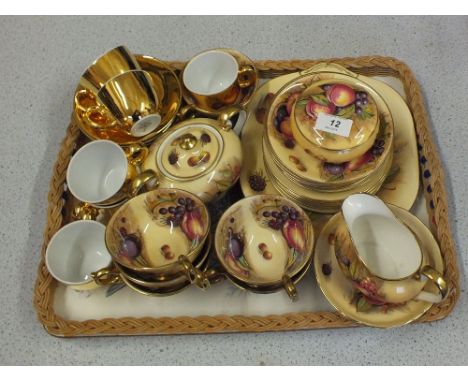 Aynsley fruit decorated tea wares plus a Royal Worcester gilt coffee set