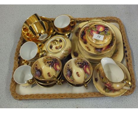 Aynsley fruit decorated tea wares plus a Royal Worcester gilt coffee set