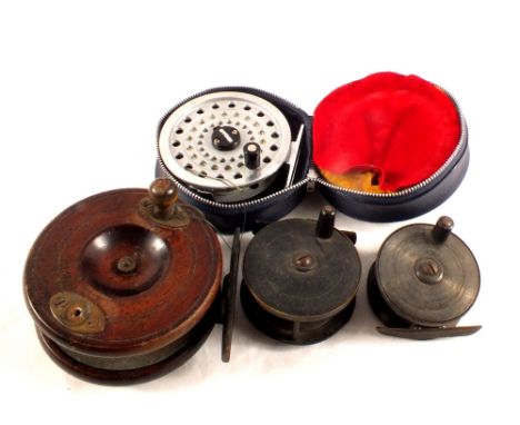 A Ryobi Gilfin fly reel plus three vintage reels, one mahogany and two metal