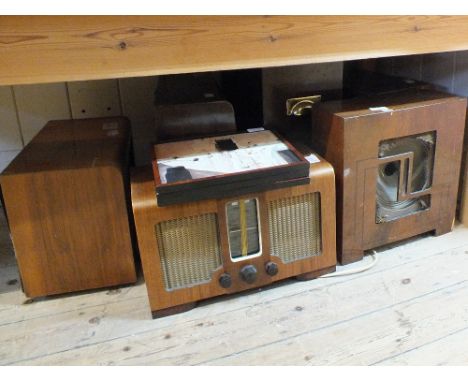 Five wooden cased mains radios, Cossor, Bush, Invicta and McMichael (2) plus a speaker, various volumes on history, modern fi