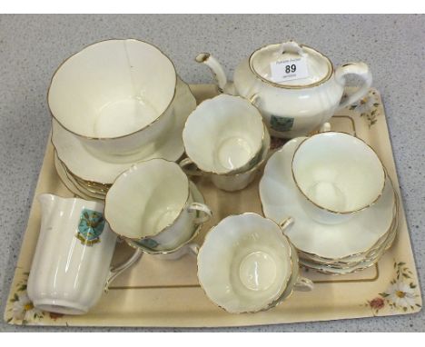 A Victorian Southwold crested china tea set to include teapot, sugar bowl, cream jug, six saucers, six tea cups etc