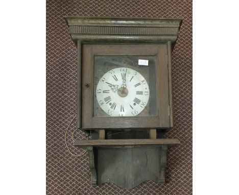 A 19th Century long cased clock movement with white enamel dial in oak case
