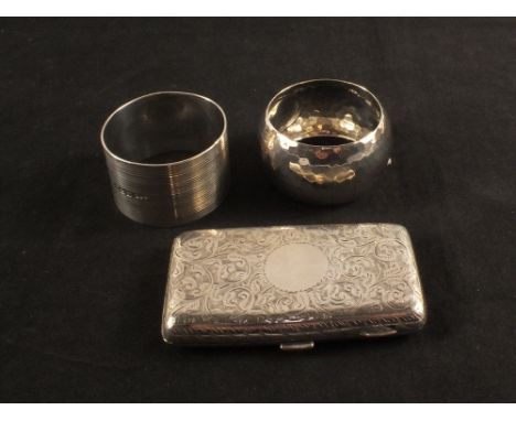Silver napkin rings, Chester 1924 and Birmingham 1905 plus a cigarette case, Birmingham 1896