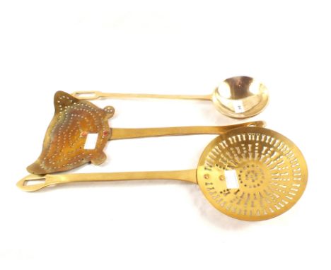 Two 19th Century brass cream skimmers plus a heavy brass ladle