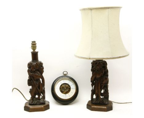 Three rootwood carved table lamps, a 19th Century mahogany toilet mirror, and a barometer