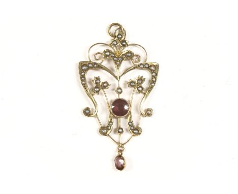 An Edwardian split pearl and garnet open work scrolling pendant, with garnet drop, signed Orros Co. 2.40g