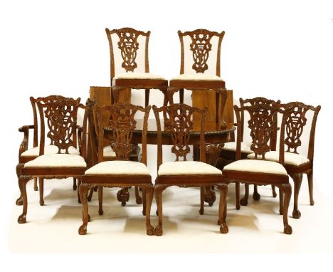 A Chippendale design mahogany dining suite, comprising of an extended dining table with two extra leaves, and a set of eight 